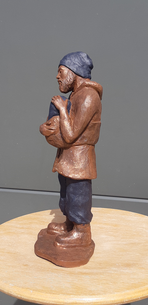 Sculpture en argile patinée représentant un père et son fils. Axelle Perret, Toulouse.